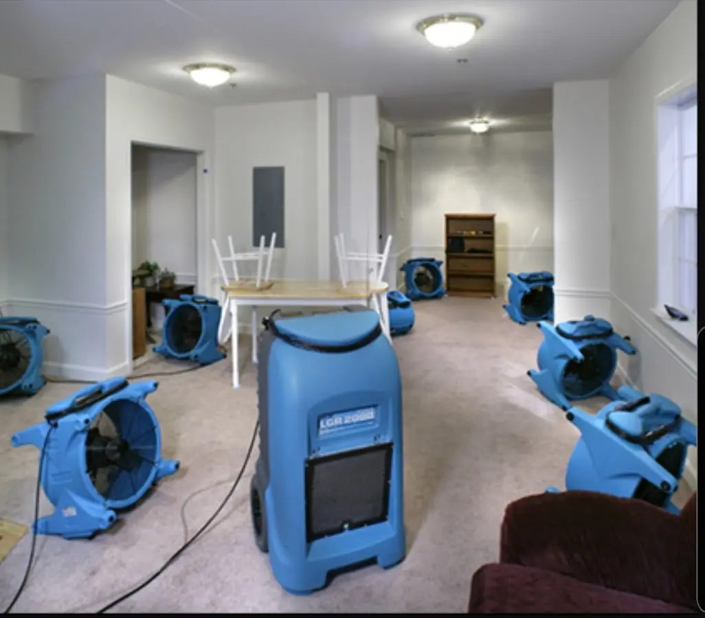 Air movers and dehumidifier setup for Water Damage Restoration in Oil City